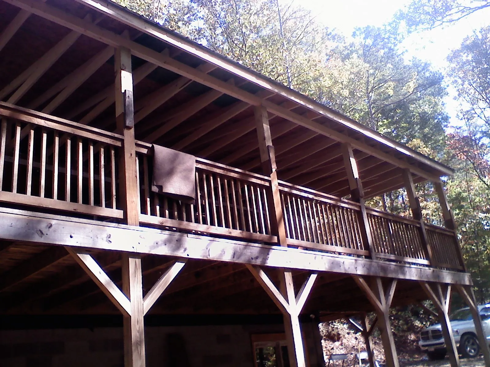 Timber framing under a new elevated porch and deck — Roof Leak Repair in Rebuck by Roofing Brothers